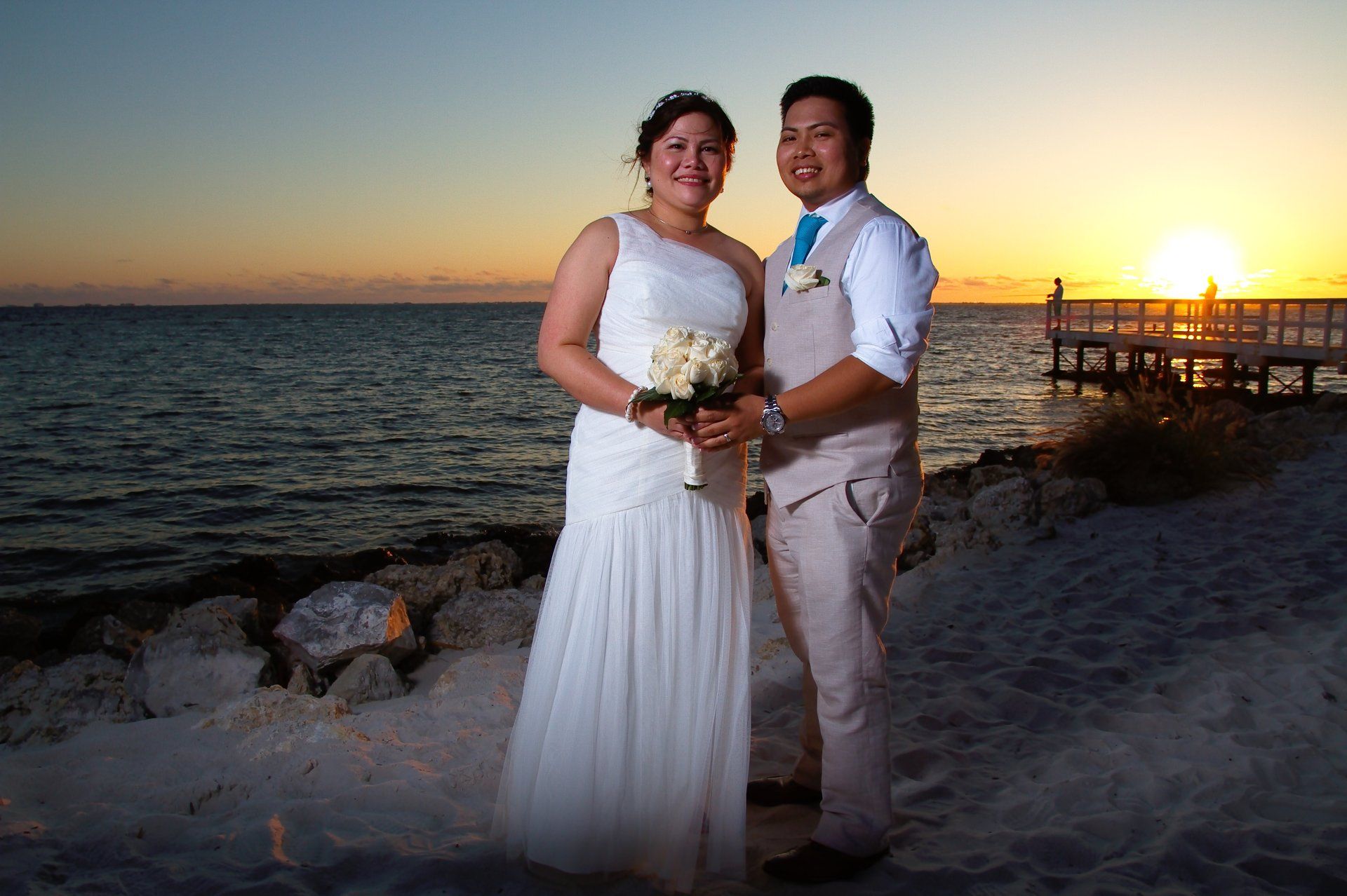 Rochelle and Nathaniel just married on the beach at sunset, April 23, 2016